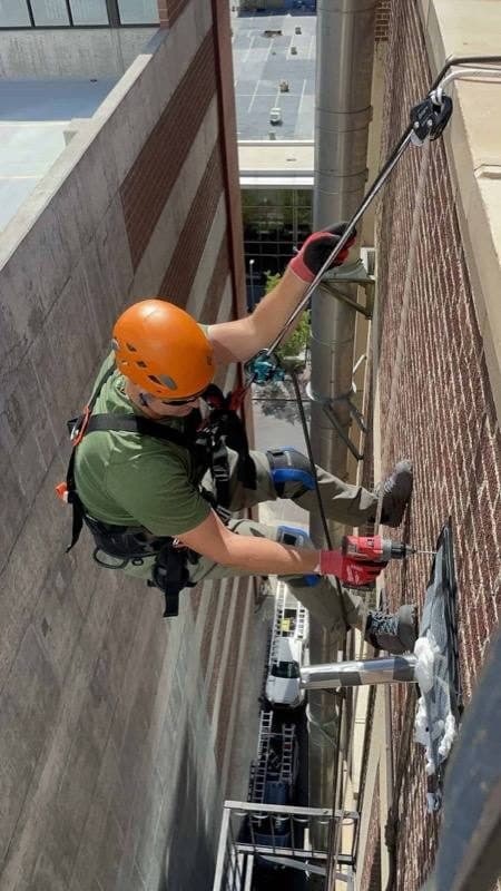 Georgia Wildlife Specialists technician at work on a bat removal job